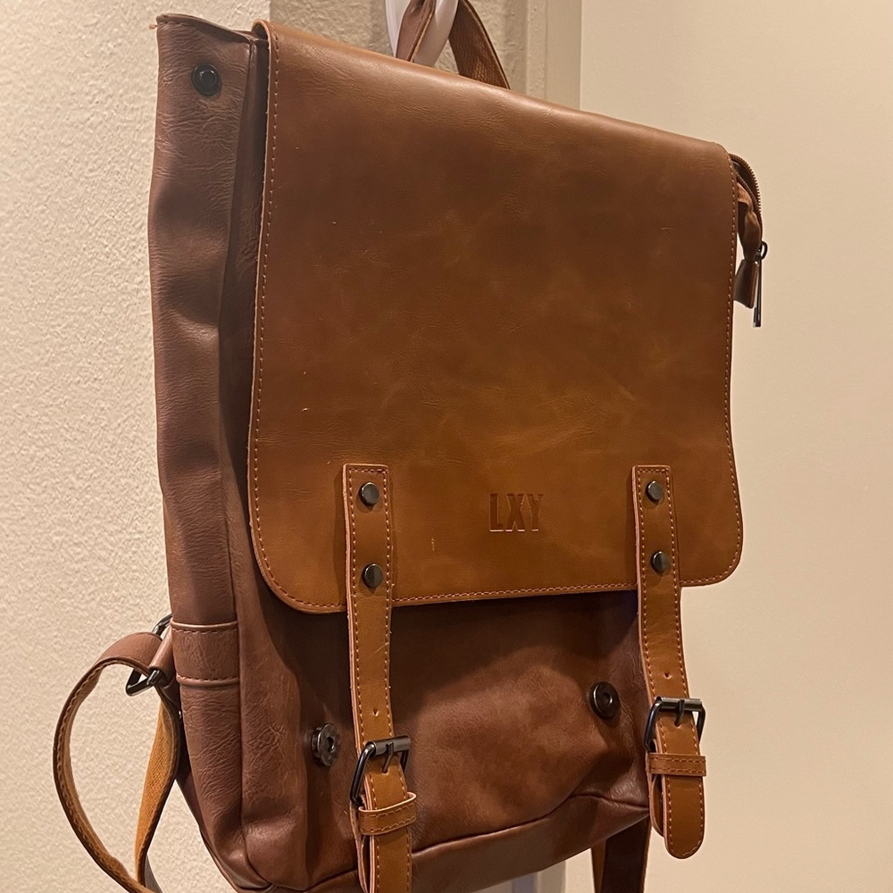 Stylish Brown Leather Backpack with Vintage Design and Structured Shape